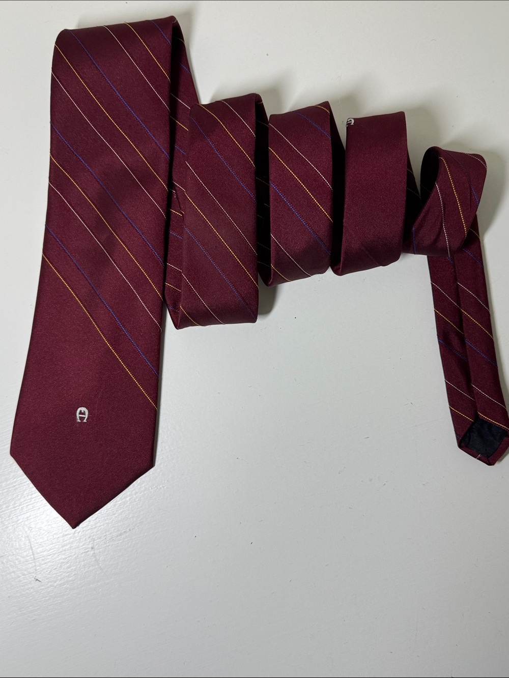 Etienne Aigner burgundy tie.